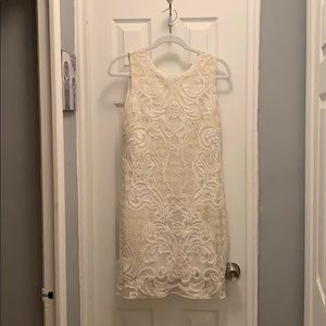 White sleeveless shift dress